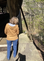 Clara ponders the bridge.